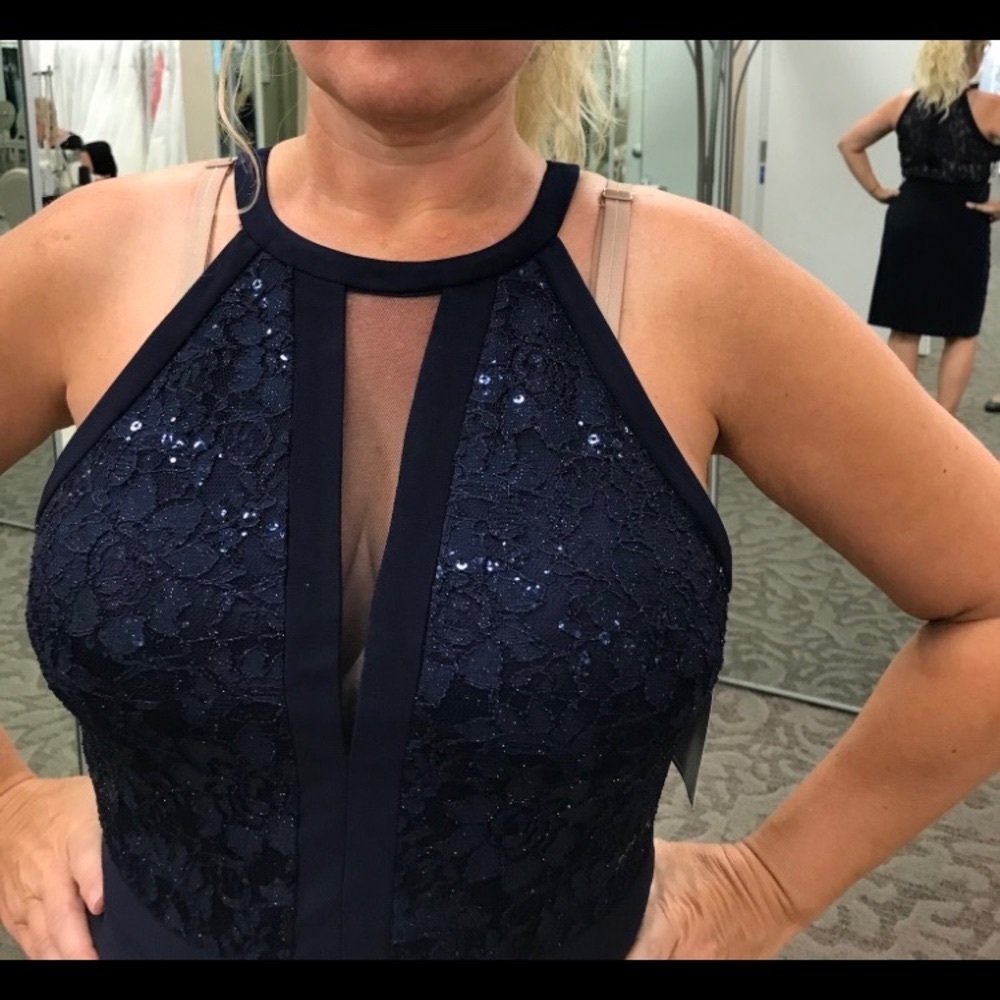 Brand new beautiful cocktail dress. Never worn with tags still attached.